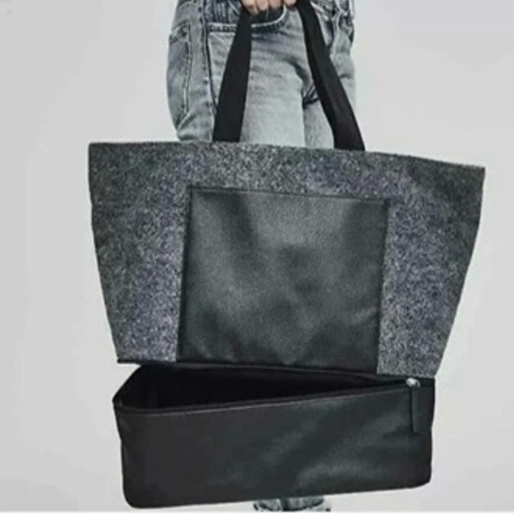 DSW exclusive gray wool weekender tote with a shoe compartment.